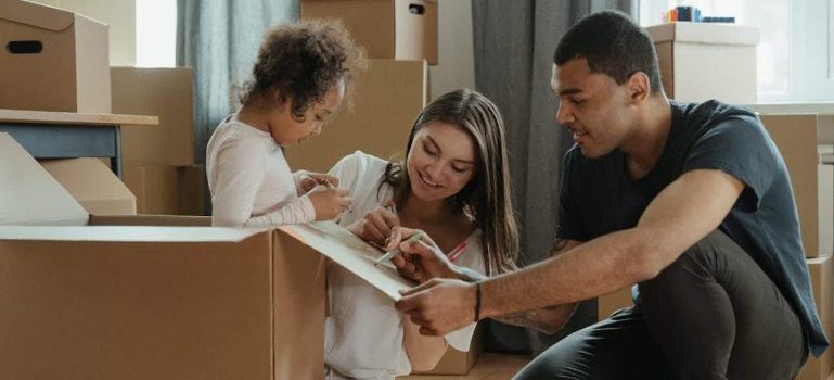 family packing and moving with kids