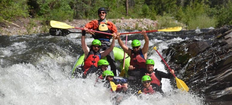 people on rafting adventure after moving to Aspen