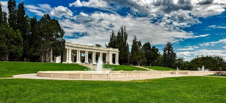 White Concrete Building Under Blue Cloudy Sky in Denver