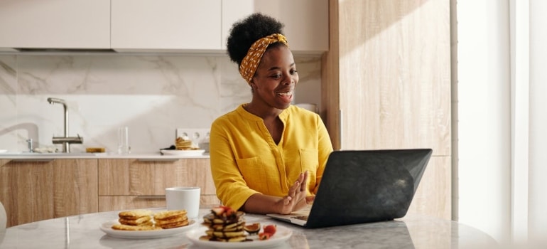 a woman using a laptop