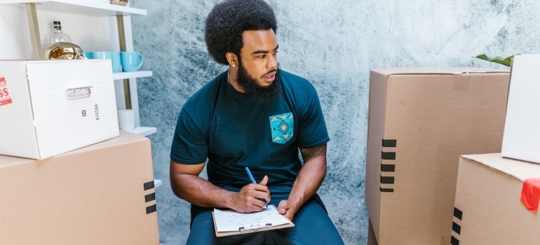 a mover making an inventory sit for senor relocation