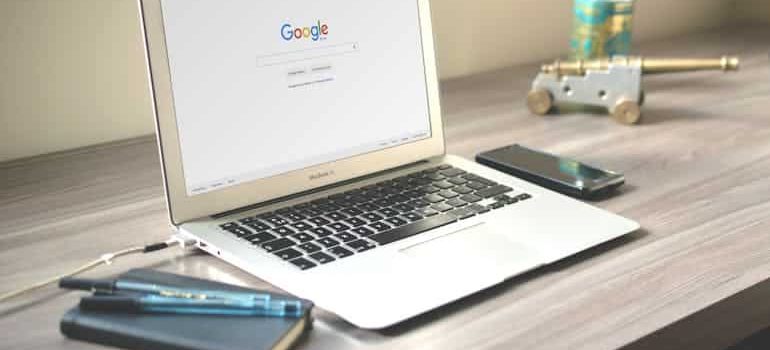 a laptop and an agenda - perfect to plan the relocation remotely