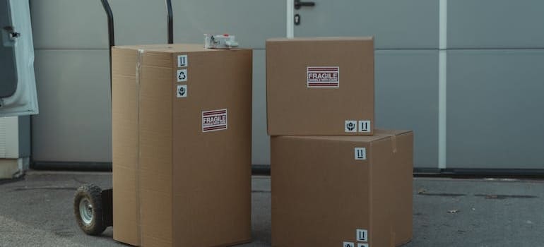a boxes on a dolly, the best way to avoid injuries when storing your items