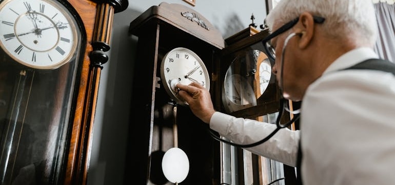 a man checking a clock